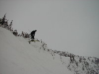 Eric (the only one without a helmet) catching sick air on Whistler Mountain...